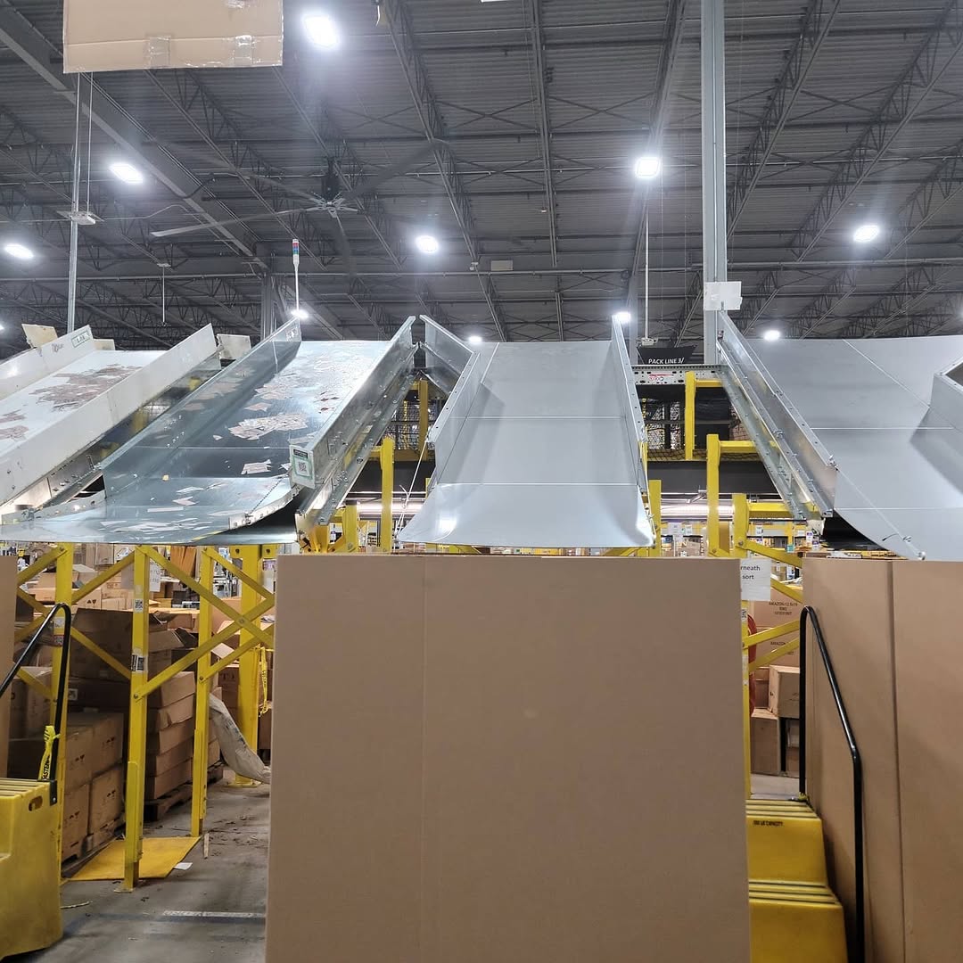 Industrial sorting chute installation inside a warehouse