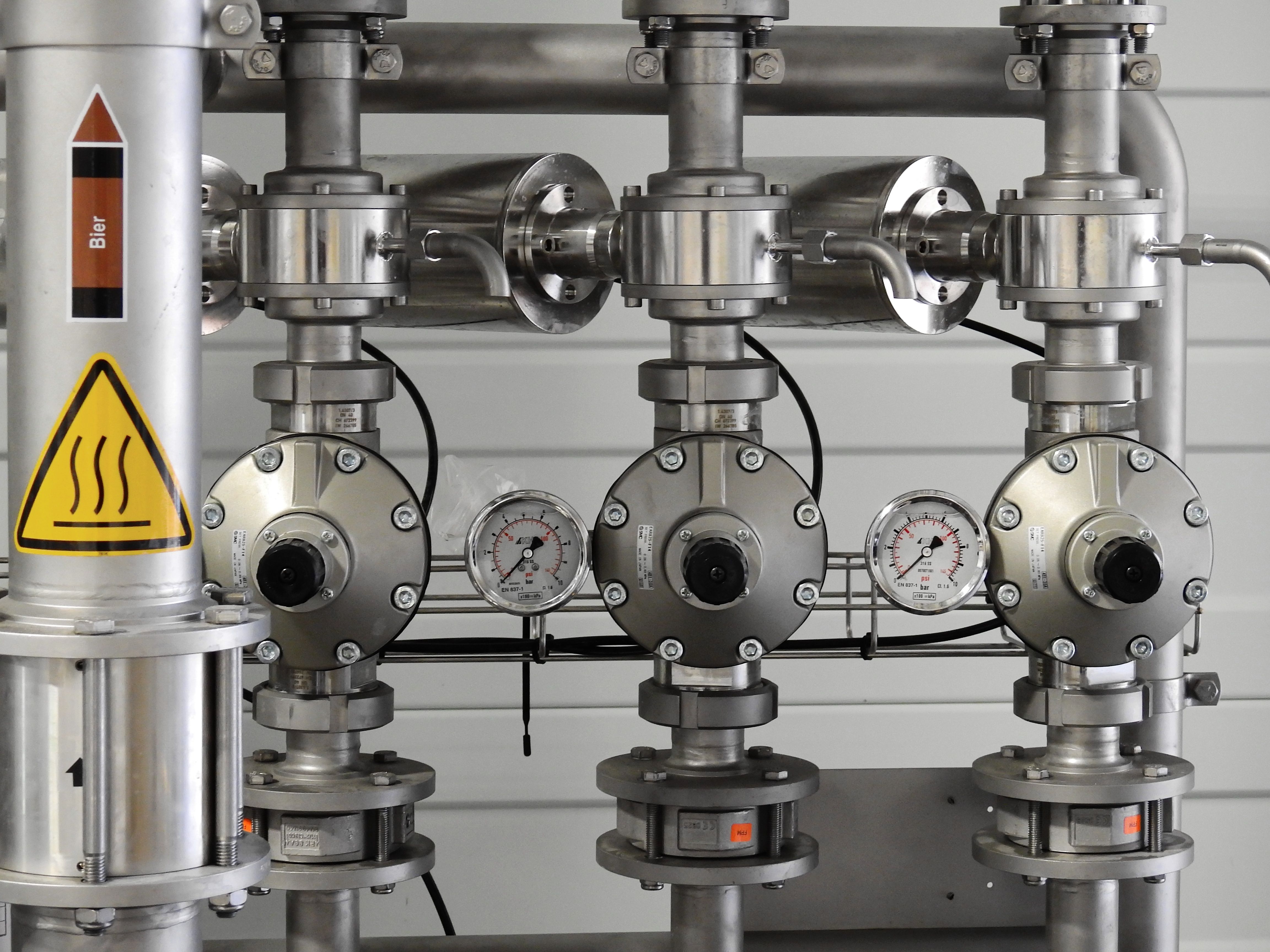 Stainless steel industrial pipes and pressure equipment in a factory